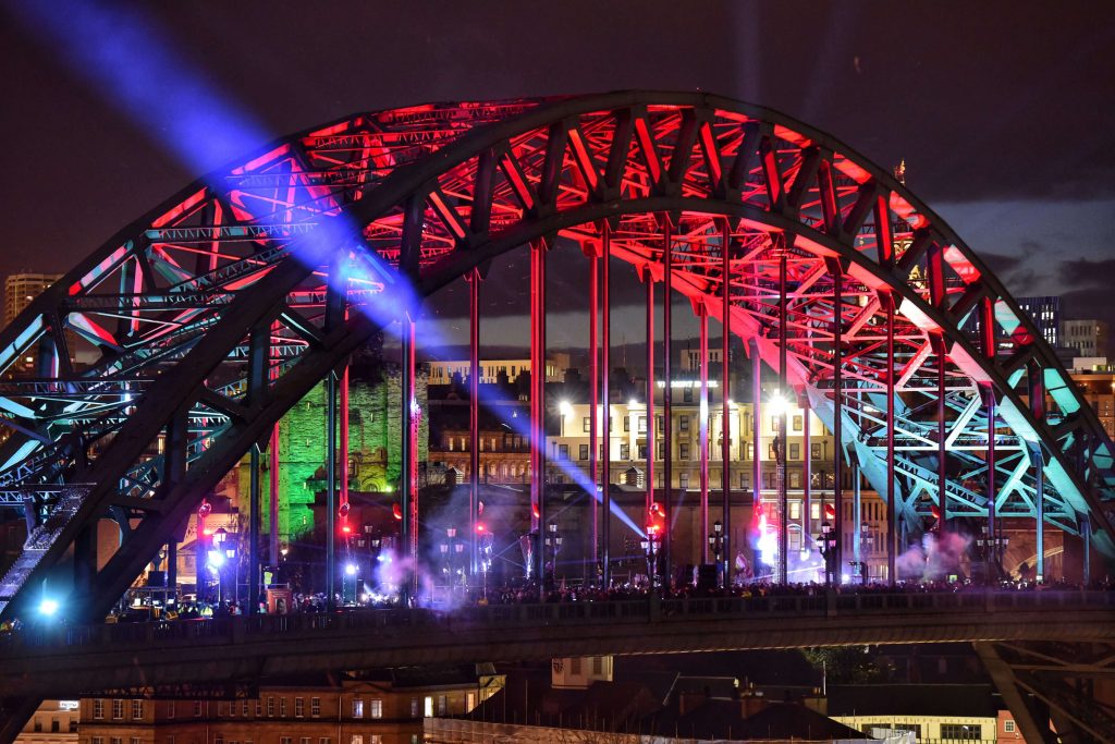 An image of the Tyne bridge at night.